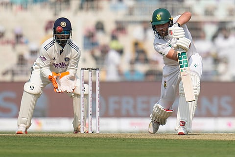South Africa's Wiaan Mulder, right, plays a shot on the first day of the first cricket test match between India and South Africa in Kolkata.