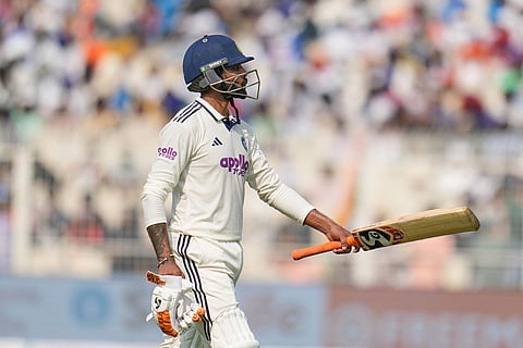 India's Ravindra Jadeja walks off the field after losing his wicket on the second day of the first cricket test match between India and South Africa in Kolkata.