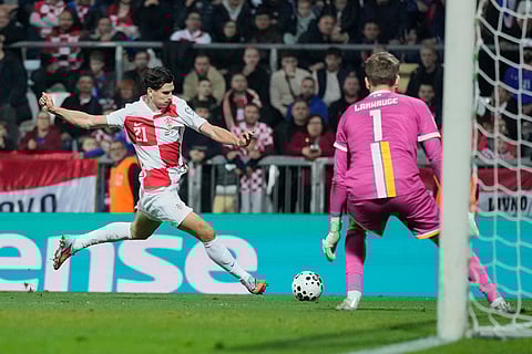 Croatia's Igor Matanovic shoots during a World Cup 2026 group L qualifying soccer match between Croatia and Faroe Islands in Rijeka, Croatia.