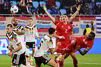 FIFA World Cup Qualifiers: Germany Blank Luxembourg 2-0, To Vie For Group A Top Spot With Slovakia | Photo: AP/Geert Vanden Wijngaert : Luxembourg's Christopher Martins, right, fights for the ball with Germany's Aleksandar Pavlovic, center, during the 2026 World Cup group A qualifying soccer match between Luxembourg and Germany in Luxembourg.