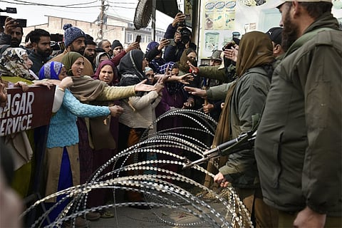 Relatives and family members mourn the death of Mohammed Shadi, who was killed in an accidental explosion at the Nowgam Police Station in Srinagar.