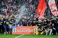 | Photo: AP/Darko Bandic : Croatian players celebrete as they qualified for the World Cup aftre defeating Faroe Islands in Rijeka, Croatia.