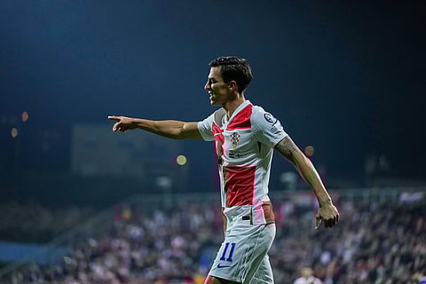 Croatia's Petar Musa reacts after scoring during a World Cup 2026 group L qualifying soccer match between Croatia and Faroe Islands in Rijeka, Croatia.