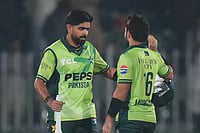 | Photo: AP/Anjum Naveed : Pakistan's Babar Azam, lef, celebrates with Mohammad Rizwan after winning the match on the end of the second one day international cricket match between Pakistan and Sri Lanka, in Rawalpindi, Pakistan.