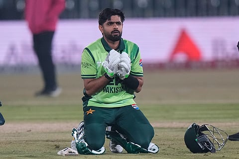 Pakistan's Babar Azam celebrates after his century during the second one day international cricket match between Pakistan and Sri Lanka, in Rawalpindi, Pakistan.