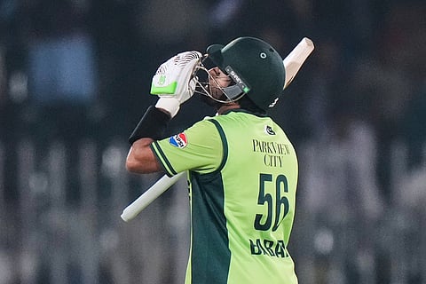 Pakistan's Babar Azam reacts after his fifty runs during the second one day international cricket match between Pakistan and Sri Lanka, in Rawalpindi, Pakistan.