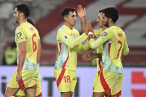 Spain's players celebrate after scoring their side's third goal during a World Cup 2026 group E qualifying soccer match between Georgia and Spain in Tbilisi, Georgia.