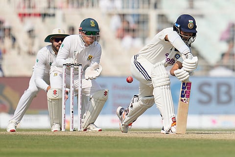 India's Washington Sundar, right, bats on the third day of the first cricket test match between India and South Africa in Kolkata, India.