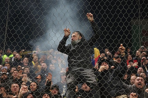 Romania's funs react during the 2026 World Cup Group H qualifier soccer match between Bosnia and Romania in Zenica, Bosnia and Herzegovina.