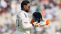 | Photo: AP/Aijaz Rahi : India's wicketkeeper Rishabh Pant wears his gear to take his position on the first day of the first cricket test match between India and South Africa in Kolkata.