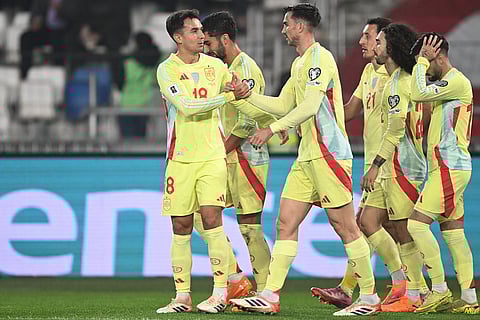 Spain's Martin Zubimendi, left, celebrates with teammates after scoring his side's second goal during a World Cup 2026 group E qualifying soccer match between Georgia and Spain in Tbilisi, Georgia, Saturday, Nov. 15, 2025. ()