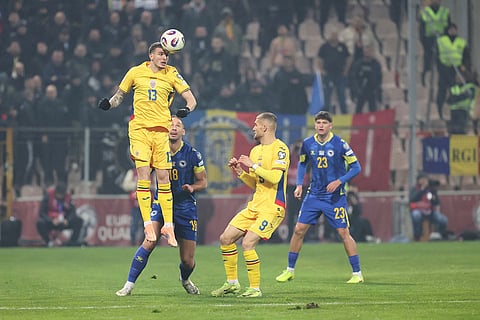 Romania's Valentin Mihaila heads the ball during the 2026 World Cup Group H qualifier soccer match between Bosnia and Romania in Zenica, Bosnia and Herzegovina.