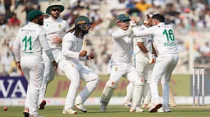 (AP Photo/Aijaz Rahi) : South Africa's Keshav Maharaj, right, and teammates celebrate prematurely for the wicket of India's Rishabh Pant on the third day of the first cricket test match between India and South Africa in Kolkata, India, Sunday, Nov. 16, 2025.