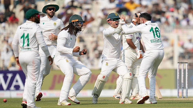 South Africa's Keshav Maharaj, right, and teammates celebrate prematurely for the wicket of India's Rishabh Pant on the third day of the first cricket test match between India and South Africa in Kolkata, India, Sunday, Nov. 16, 2025. - (AP Photo/Aijaz Rahi)