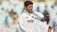 (AP Photo/Aijaz Rahi) : India's captain Shubman Gill reacts as he leaves the field after retired hurt on the second day of the first cricket test match between India and South Africa in Kolkata, India, Saturday, Nov. 15, 2025.