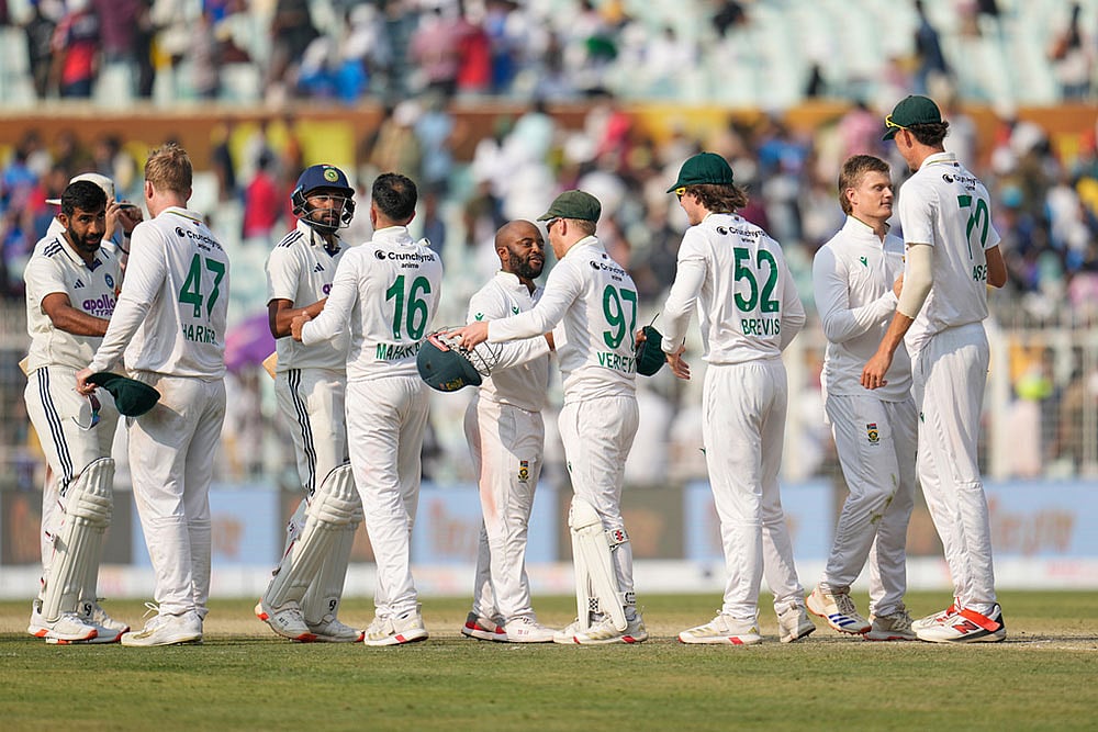 Players of the two teams greet each other after South Africa won the first cricket test match against India in Kolkata, India. - | Photo: AP/Aijaz Rahi