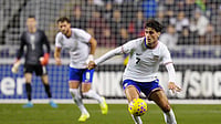 USA Vs Paraguay: American Soccer Enigma Gio Reyna Earns Generational Bragging Rights In Intense Friendly (AP Photo/Derik Hamilton) : United States' Gio Reyna controls the ball during the second half of an international friendly soccer match against Paraguay, Saturday, Nov. 15, 2025, in Chester, Pa.