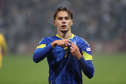 Bosnia's Amar Dedic celebrates after Esmir Bajraktarevic, scored his side's second goal during the 2026 World Cup Group H qualifier soccer match between Bosnia and Romania in Zenica, Bosnia and Herzegovina.