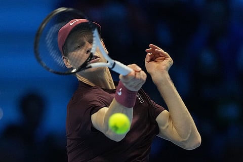 Italy's Jannik Sinner returns to Spain's Carlos Alcaraz during the final tennis match of the ATP World Tour Finals, in Turin, Italy.