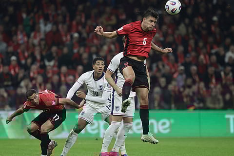 Albania's Berat Djimsiti heads the ball during the World Cup 2026 group K qualifying soccer match between Albania and England, in Tirana, Albania.