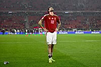 Troy Parrott Hat-Trick Helps Ireland Defeat Hungary 3-2, Enter FIFA World Cup 2026 Playoffs | Photo: AP/Denes Erdos : Hungary's Dominik Szoboszlai is dejected at the end of the World Cup 2026 group F qualifying soccer match between Hungary and Ireland in Budapest, Hungary.