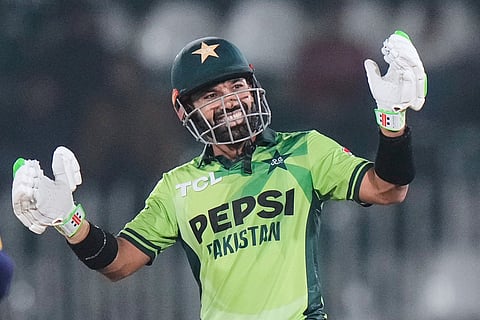 Pakistan's Mohammad Rizwan celebrates after his fifty runs during the third one day international cricket match between Pakistan and Sri Lanka, in Rawalpindi, Pakistan.