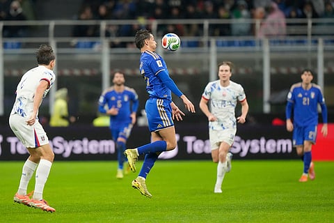 Italy's Pio Esposito controls the ball during the 2026 World Cup Group I qualifier soccer match between Italy and Norway in Milan, Italy.