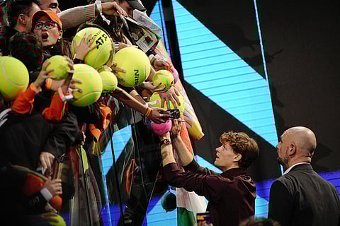Italy's Jannik Sinner with fans after winning the final tennis match of the ATP World Tour Finals against Spain's Carlos Alcaraz, in Turin, Italy.