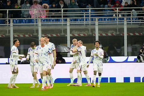 Norway's Erling Haaland, centre, celebrates with teammates after scoring his side's second goal during the 2026 World Cup Group I qualifier soccer match between Italy and Norway in Milan, Italy.