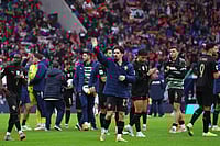 | Photo: AP/Luis Vieira : Portugal's Vitinha waves at the end of a World Cup 2026 group F qualifying soccer match between Portugal and Armenia in Porto, Portugal.