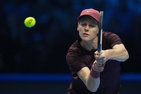 Italy's Jannik Sinner returns to Spain's Carlos Alcaraz during the final tennis match of the ATP World Tour Finals, in Turin, Italy.