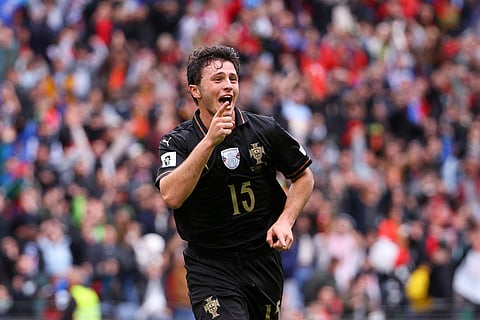 Portugal's Joao Neves celebrates after scoring his side's fourth goal during a World Cup 2026 group F qualifying soccer match between Portugal and Armenia in Porto, Portugal.
