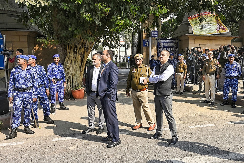 Officials at Patiala House Court as the NIA prepared to produce Amir Rashid Ali, in whose name the car involved in the blast near the Red Fort was registered, in New Delhi. - | Photo: PTI