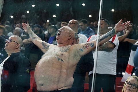 A fan of England cheers for his national team during the World Cup 2026 group K qualifying soccer match between Albania and England, in Tirana, Albania.