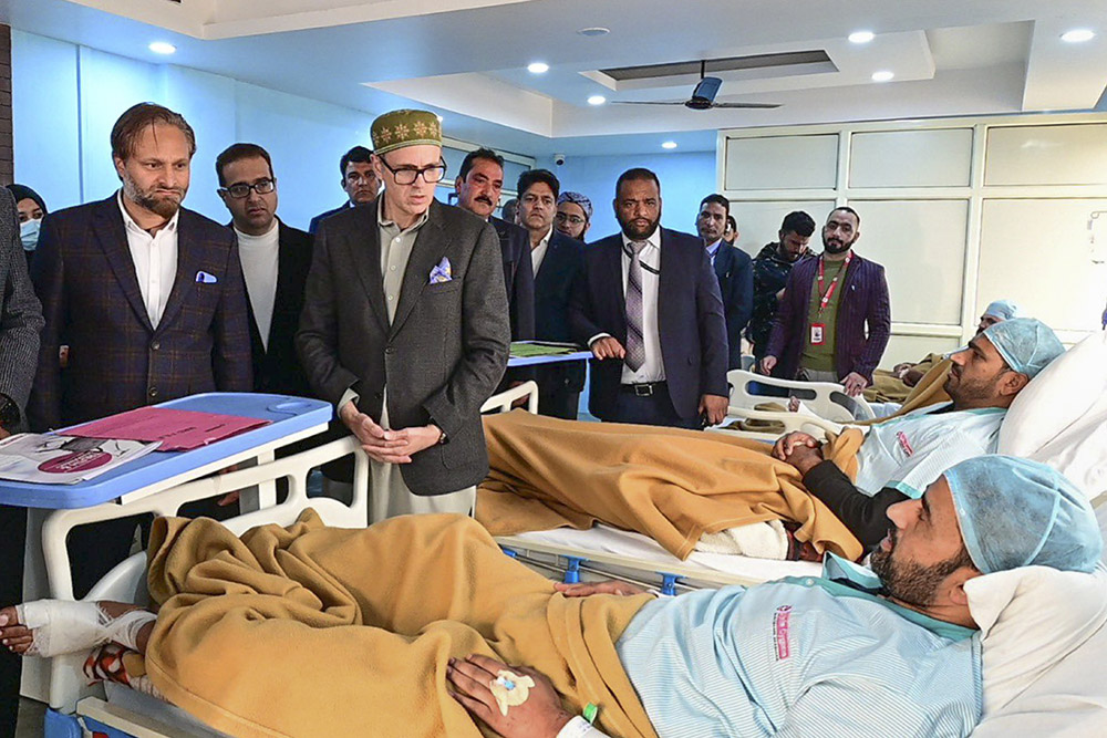 Jammu and Kashmir Chief Minister Omar Abdullah meets injured victims undergoing treatment in the aftermath of an accidental explosion at Nowgam police station, in Srinagar district. 