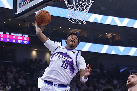 Utah Jazz guard Ace Bailey dunks against the Chicago Bulls during the first quarter of an NBA basketball game in Salt Lake City. 