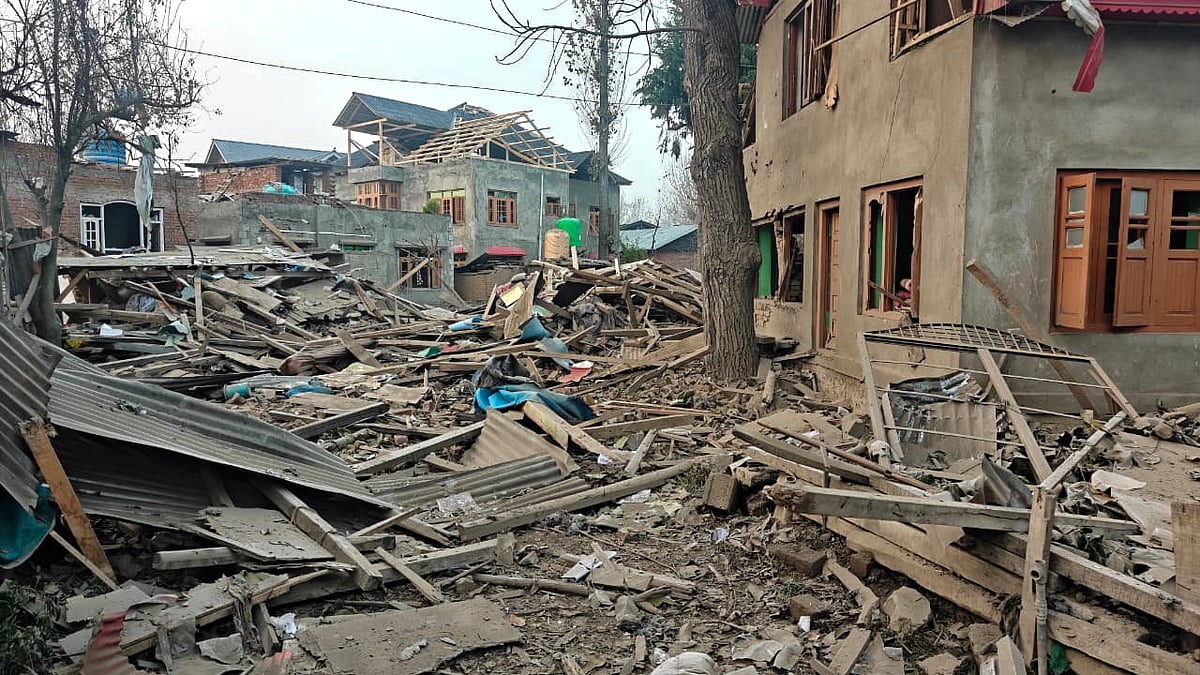 PTI  : Debris at the site after the house of Dr Umar Nabi, who drove the explosive-laden car involved in the Delhi blast, was demolished by security forces, in Jammu and Kashmir's Pulwama district, Friday, Nov. 14, 2025. The demolition was carried out during the intervening night of Thursday and Friday, according to officials.