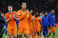 NED 4-0 LIU, FIFA WC Qualifiers: Dutch Register Routine Win | Photo: AP/Peter Dejong : Netherlands' Virgil van Dijk, front, and teammates celebrate after a World Cup 2026 group G qualifying soccer match between Netherlands and Lithuania in Amsterdam, Netherlands.