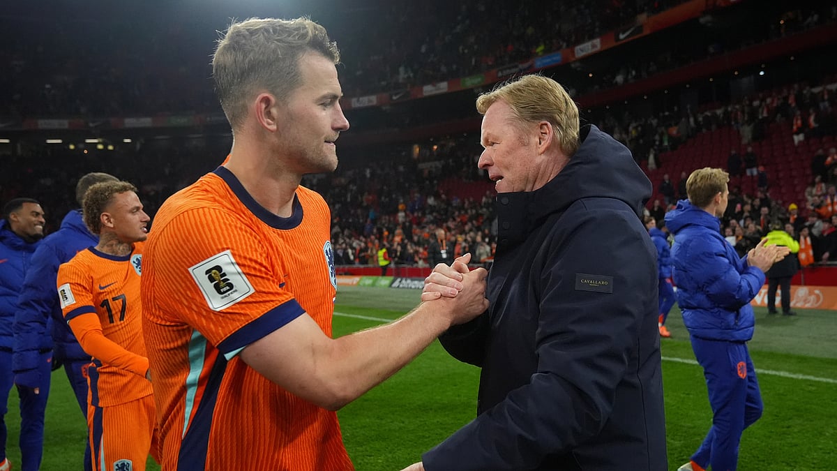 Netherlands boss Ronald Koeman and Matthijs de Ligt - null