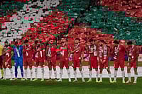 Palestinian Team Plays Friendly In Spain In Front Of 50,000 Spectators | Photo: AP/Miguel Oses : Palestinian players line up ahead of a friendly match against Spanish players from the Basque Country, held to protest Israel's military actions in Gaza, in Bilbao, Spain.