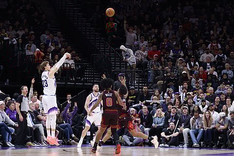 Utah Jazz forward Lauri Markkanen (23) makes a three-point basket against the Chicago Bulls during the second half of an NBA basketball game in Salt Lake City. 