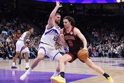 Chicago Bulls guard Josh Giddey (3) drives against Utah Jazz guard Svi Mykhailiuk (10) during the second half of an NBA basketball game in Salt Lake City. 