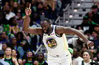 NBA: Golden State Warriors Beat New Orleans Pelicans 124-106; Draymond Green Has Fan Confrontation | Photo: AP/Butch Dill : Golden State Warriors forward Draymond Green reacts after a basket against the New Orleans Pelicans during the third quarter of an NBA basketball game in New Orleans.