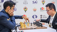 Michal Walusza : Arjun Erigaisi (left) and Wei Yi of China during their quarter-finals game 2 at FIDE World Cup 2025.