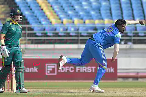 India A's Harshit Rana bowls during the 3rd unofficial ODI cricket match between India A and South Africa A, at Niranjan Shah Stadium in Rajkot.