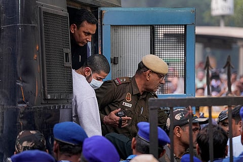 Gangster Anmol Bishnoi, wanted in connection with the killing of NCP leader Baba Siddique, being brought to the Patiala House Court, after he was deported to India from the US, in New Delhi.