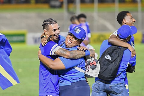 Curaçao players celebrate qualifying for the 2026 FIFA World Cup after a soccer match against Jamaica in Kingston, Jamaica.