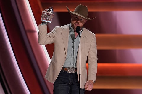 Cody Johnson receives the award for male vocalist of the year during the 59th Annual Country Music Association Awardsat Bridgestone Arena in Nashville, Tennessee. 