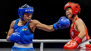 PTI : India's Nikhat Zareen, in blue, in action against Chinese Taipei's Guo Yi-Xuan during the women's 51kg final at the World Boxing Cup Finals 2025 in Greater Noida.