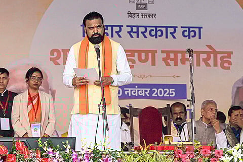 BJP MLA Samrat Chaudhary takes oath as the Deputy Chief Minister of Bihar during the swearing-in ceremony, at Gandhi Maidan in Patna.